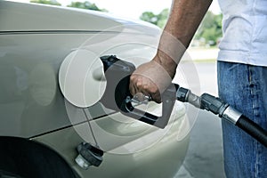 Gas pump in the hand