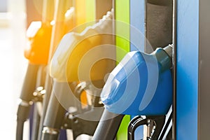 Gas station Fuel pump.Colorful Petrol pump filling nozzles in gas petrol filling station
