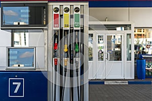 Gas station the three colorful fuel pump column