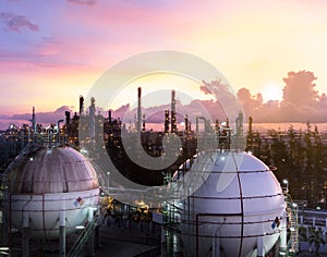 Gas storage spheres tank in petrochemical plant at dawn