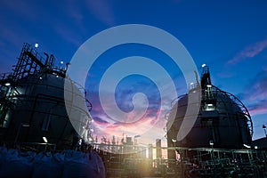 Gas storage spheres tank in petrochemical plant at dawn