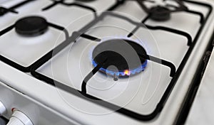 Gas stove with flame, saving energy, price concept