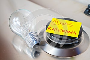 Gas stove and `gas rationing` ticket. Energy crisis and economic recession.