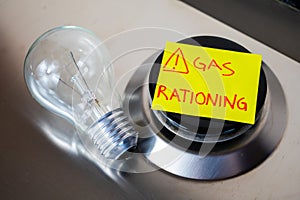 Gas stove and `gas rationing` ticket. Energy crisis and economic recession.