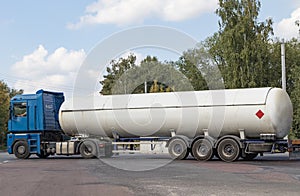 A gas tanker on a city highway