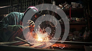 Gas welding with workpiece steel.working person in factory industry.