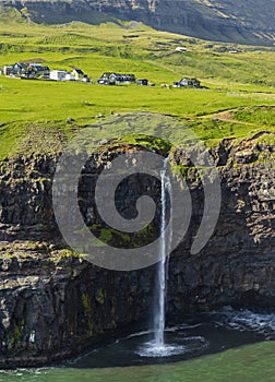 Gasadalur village and  Beautiful  waterfall, Sunny Day, Vagar, Faroe Islands, Denmark