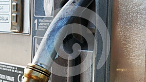 Gasoline or petrol station gas fuel pump nozzle. Filling station. Close-up of using fuel nozzles at a gas station.