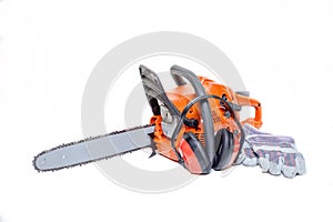 Gasoline powered modern chainsaw with protective gear