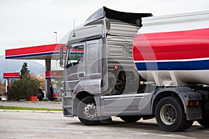 Gasoline truck near a gas station