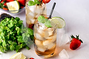 Gasses of Cold Citrus and Strawberry Ice Tea Decorated with Slice of Lemon and Strawberry Healthy Summer Drink Horizontal Fresh