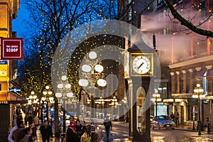 Vancouver Gastown Steam Clock and beautiful street view on a rainy night.