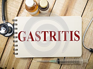 Gastritis, text words typography written with wooden letter, health and medical