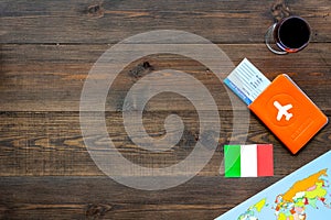 Gastronomical tourism. Italian food symbols. Passport and tickets near italian flag, bottle of red wine, map of the