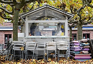 Gastronomy lockdown, closed restaurant terrace, beer garden due to corona epidemic, chairs and tables stacked