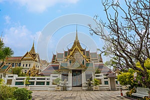 Gate with background of Dusit Maha Prasat and Chakri Maha Prasat in Grand palace, Bangkok, Thailand