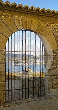 Gate and bay of Ibiza town Eivissa, Spain photo