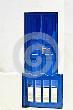 Gate and Blue Door