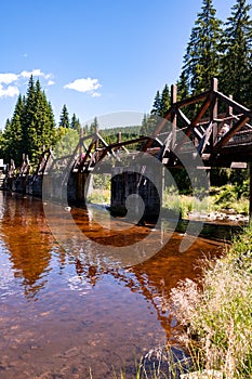 The gate bridge or rechle near Modrava is a waterworks, ensuring the branching of part of the water from the river Vydra into the