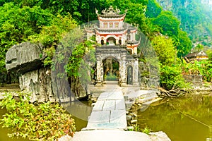 Gate entrance to old Bich pagoda complex, Tam Coc, Ninh Binh, Vietnam