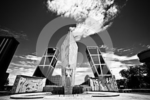 Gate of Europe with monument Jose Calvo Sotelo and unique cloud