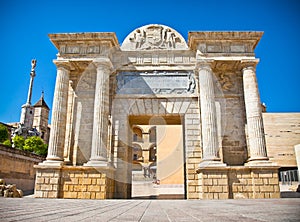 Gate on famous Roman bridge over the Guadalquivir river