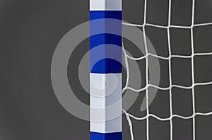 Gate for futsal or handball in gym. Detail of gate frame and net. Outdoor football or handball playground