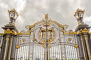 Gate with gilded ornaments in Buckingham Palace, London