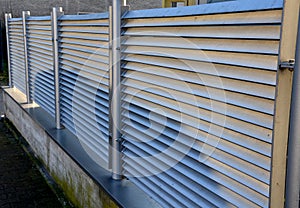 gate and ground made of metal aluminum slats. powder fired paint