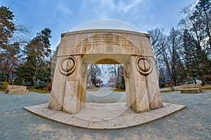 Gate of the Kiss. It is a stone sculpture made by Constantin Brancusi.