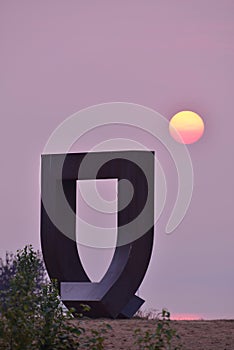 The Gate at Kitsilano Beach and smoky sunset