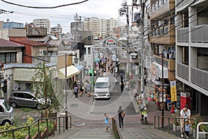 The gate leading to the old fashioned shitamachi village shopping district of Yanaka Ginza in northern Tokyo