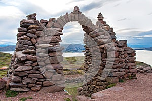 A gate leading to Pacha Tata Temple, Amantani, Peru