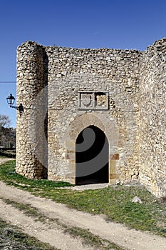 Gate of the mountain in the medieval wall of Palazuelos, Spain