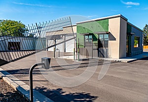 Gate opens to allow vehicle entrance at a mini storage unit business