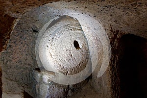 Gate stone at major tourist attraction of Turkey underground city Kaymakli