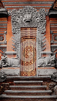Gate of temple decorated with ornaments. Indonesia, Bali