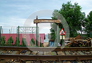 Entrance next to the train track to the Olimp beach in Romania.