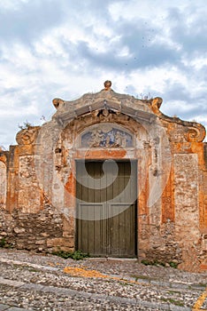 The gate to the garden of the old church