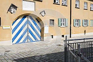 Gate to the historical Landmark Fuggerei in Augsburg