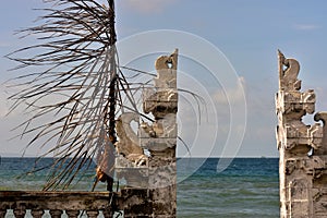 Gate to the ocean. View near Candi Dasa, Bali, Indonesia photo