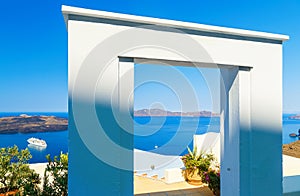 Gate to the sea - Santorini island. View on steps leading down and overlooking the Calero and cruise ship in Bay