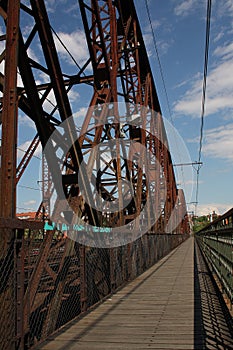 The gate for train to the Prague - rail bridge over river