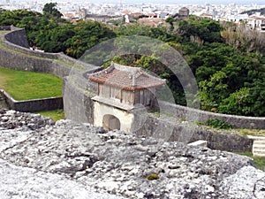 Gate and Walls of Shuri Castle and Okinawa Cityscape