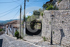 Gated entrance to a house in the hills of city of Berat in Albania