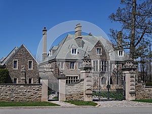 Gated stone mansion photo
