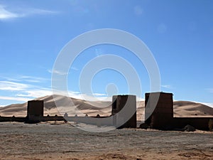 Gatehouses and Wall Before Sahara Dunes