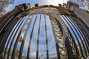 Gates with golden details. Entrance of Green Park next to Buckingham Palace