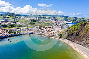 Gates Portao, idyllic beach Praia and azure turquoise Baia do Porto Pim, Horta town, Faial island, Azores, Portugal. photo