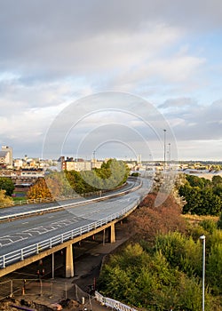 Gateshead UK: Oct 2021: The A167 flyover in Gateshead city centre skyline in autumn with nice warm sunlight